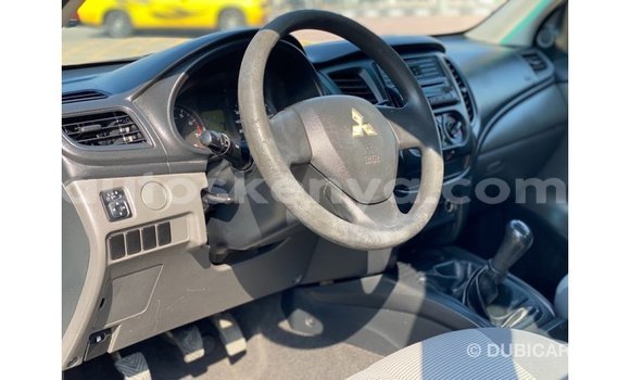 Imported Mitsubishi L200 White Makiinaa iti Import - Dubai keessatti Central Kenya keessatti Imported Mitsubishi L200 White Makiinaa iti Import - Dubai keessatti Central Kenya keessatti