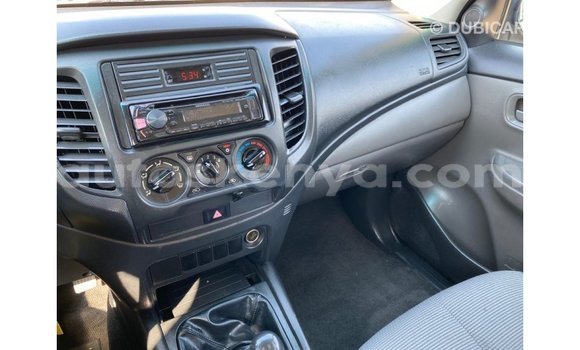 Imported Mitsubishi L200 White Makiinaa iti Import - Dubai keessatti Central Kenya keessatti Imported Mitsubishi L200 White Makiinaa iti Import - Dubai keessatti Central Kenya keessatti