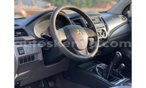 Imported Mitsubishi L200 White Makiinaa iti Import - Dubai keessatti Central Kenya keessatti Imported Mitsubishi L200 White Makiinaa iti Import - Dubai keessatti Central Kenya keessatti