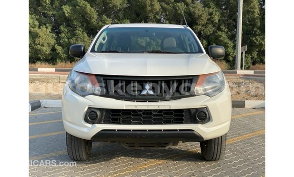 Imported Mitsubishi L200 White Makiinaa iti Import - Dubai keessatti Central Kenya keessatti Imported Mitsubishi L200 White Makiinaa iti Import - Dubai keessatti Central Kenya keessatti