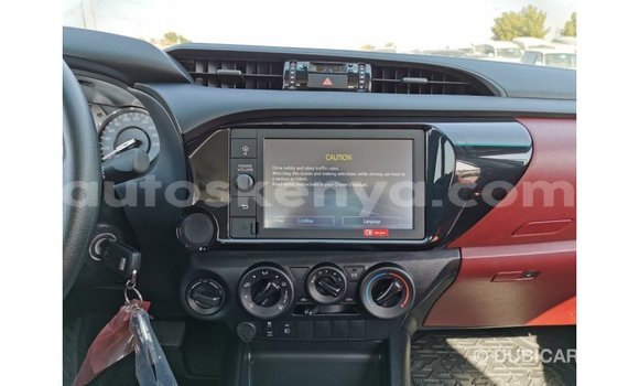 Imported Toyota Hilux White Makiinaa iti Import - Dubai keessatti Central Kenya keessatti Imported Toyota Hilux White Makiinaa iti Import - Dubai keessatti Central Kenya keessatti