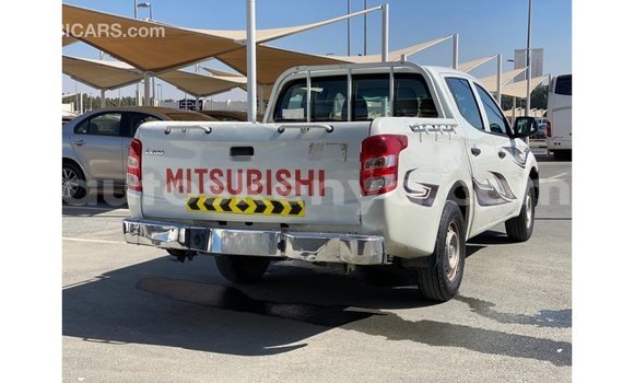 Imported Mitsubishi L200 White Makiinaa iti Import - Dubai keessatti Central Kenya keessatti Imported Mitsubishi L200 White Makiinaa iti Import - Dubai keessatti Central Kenya keessatti