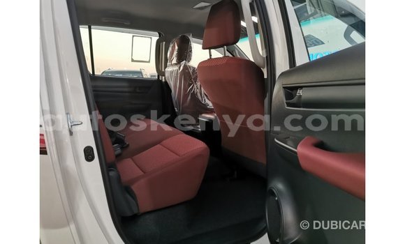 Imported Toyota Hilux White Makiinaa iti Import - Dubai keessatti Central Kenya keessatti Imported Toyota Hilux White Makiinaa iti Import - Dubai keessatti Central Kenya keessatti
