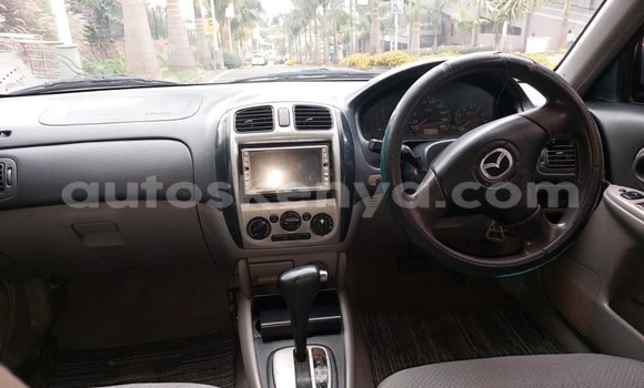 Oofamaa Mazda Familia Blue Makiinaa iti Nairobi keessatti Nairobi keessatti Oofamaa Mazda Familia Blue Makiinaa iti Nairobi keessatti Nairobi keessatti