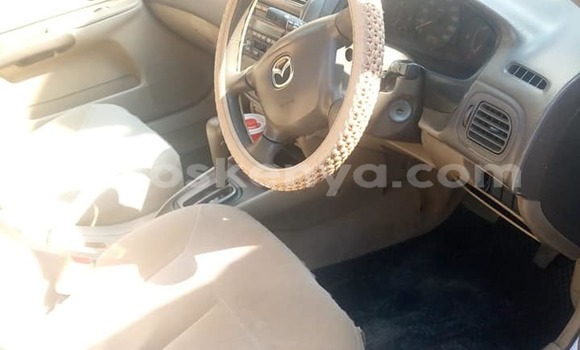 Oofamaa Mazda Familia Silver Makiinaa iti Nairobi keessatti Nairobi keessatti Oofamaa Mazda Familia Silver Makiinaa iti Nairobi keessatti Nairobi keessatti