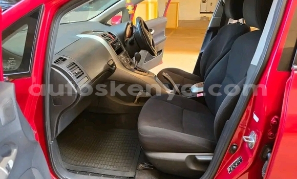 Oofamaa Toyota Auris Red Makiinaa iti Changamwe keessatti Coast keessatti