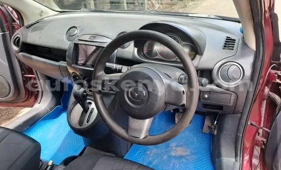 Oofamaa Mazda Demio Red Makiinaa iti Bute keessatti Northeast Kenya keessatti Oofamaa Mazda Demio Red Makiinaa iti Bute keessatti Northeast Kenya keessatti