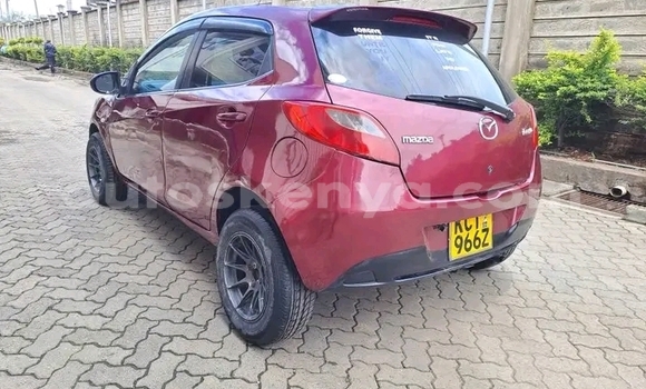 Oofamaa Mazda Demio Red Makiinaa iti Bute keessatti Northeast Kenya keessatti Oofamaa Mazda Demio Red Makiinaa iti Bute keessatti Northeast Kenya keessatti